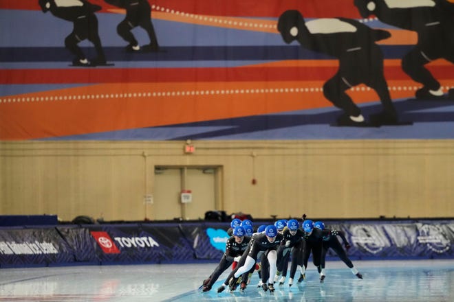 Athletes compete in the Women's Mass Start event during the 2022 U.S. Olympic Trials at Pettit National Ice Center on Jan. 9.
