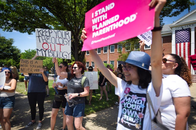 Pro-abortion protesters are seen at the Pride Block Party outside Fair Lawn City Hall on Sunday, June 26, 2022.