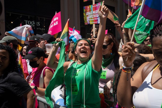 Emma Kaplan (center) takes part in the NYC Pride March on June 26, 2022 in New York. 