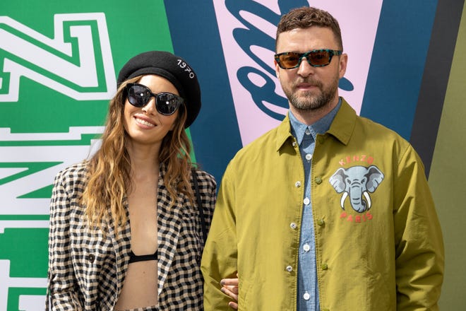 Singer Justin Timberlake, right, and wife Jessica Biel attend the Kenzo menswear spring-summer 2023 show as part of Paris Fashion Week on June 26, 2022.
