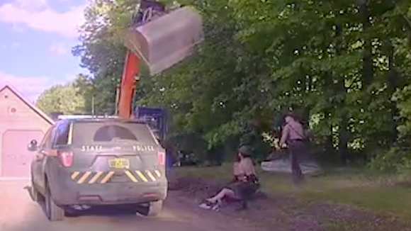 Dramatic video shows Vermont man using excavator to stop police from arresting his son