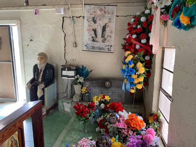 The shrine to Don Pedro Jaramillo, "Healer of Los Olmos," lies just outside Falfurrias. The faithful leave photos of their stricken loved ones on the walls of the shrine.