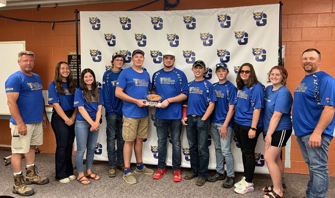 The Trapshooting team was commended at Monday nights school board meeting. They were 2nd in the conference . The team has 20 members in grades 6th through 12th grade.  Five members of the team will attend Nationals on July 6th through the 10th in Michigan.

Pictured from left, Coach Joe Conner, Avery Dooley, Lily Wigant, Grayson Burke, T.J. Conner, Chance Yocum, Jake Conrad, Wyatt Johnson, Mia Merkel, Katie Clemons, and Coach Burke.  Absent from the Monday night picture were: Wade Rachel, Summit Ouart, Caden Rachel, Talan Hull, Jared O’Brien, Thomas Funke, Camron O’Brien, Jonas Porsche, Amelia Wigant, Collin Wigant, and Victoria Conner.

This is the fourth season for the Galva team.