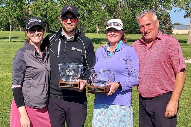 Golfers, from left, Kylie and Mitch Brunick of Sioux Falls and Mary Wicks-Neuroth and Mike Neuroth of Watertown won championships in the South Dakota Golf Association's Husband-Wife and Senior Husband-Wife Championships that concluded Sunday at the Brookings Country Club. The Brunicks won the championship division by four shots over defending champions Justin and Morgan Johnson of Watertown. The Neuroths won their second title (the other came in 2020) in the Senior Championhip, winning by a shot over two-time champions Scott and Jackie Whitlock of Aberdeen and Russ and Cara Boehler of Rapid City.