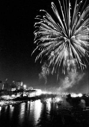 The Fourth of July fireworks is producing a spectacular showering of lights across the night sky during the Independence Day Celebration over Riverfront Park July 4, 1985.