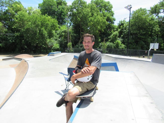 Glass artist Carson Wedlake takes a break after a "sesh" at the new Tuttle Skatepark, 240 W. Oakland Ave. in the University District, just south of Clintonville.