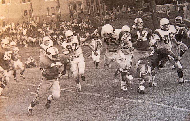 John “The Flea” Carter looks for some running room in a Monmouth home game. Carter scored the clinching touchdown in the Fighting Scots’ 1972 victory over Knox.