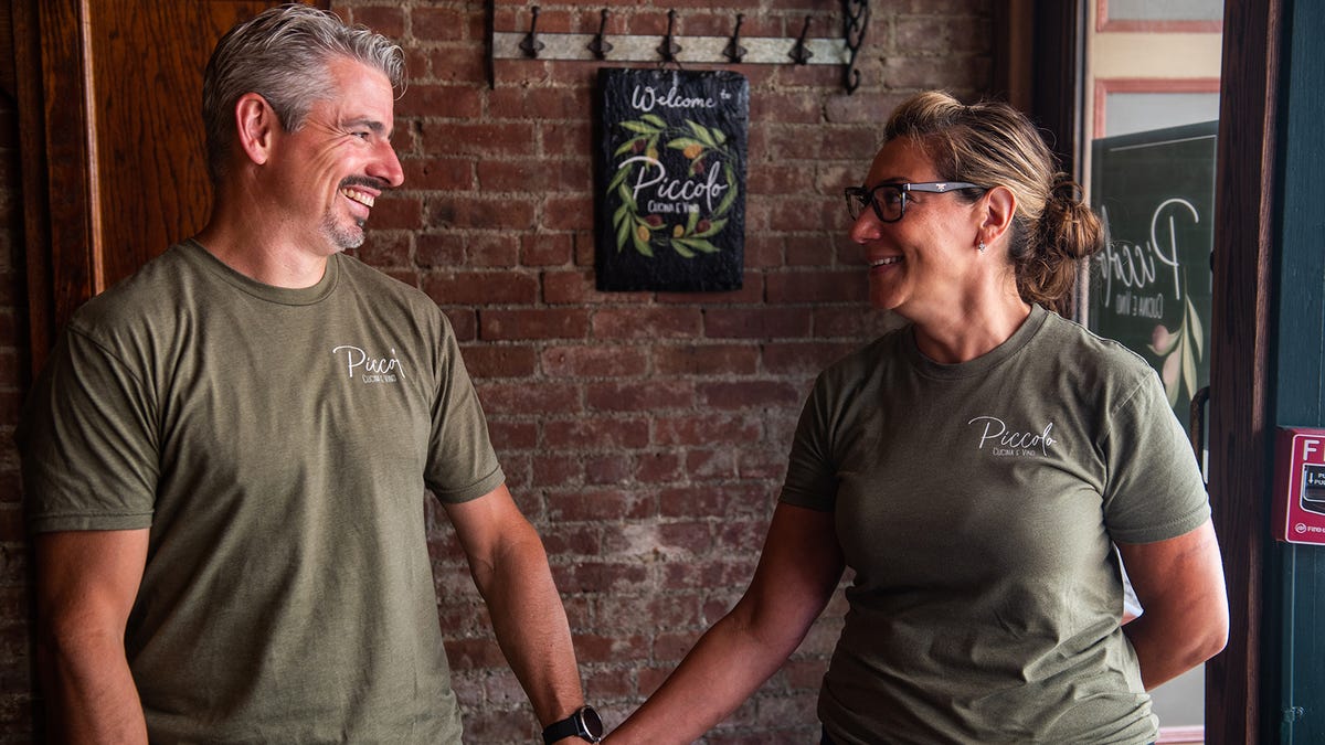 Dave Madden and Anna Madden, owner of Piccolo Cucina e Vino, right, stand for a portrait at Piccolo Cucina e Vino in Middletown, NY, on Tuesday, June 28, 2022.