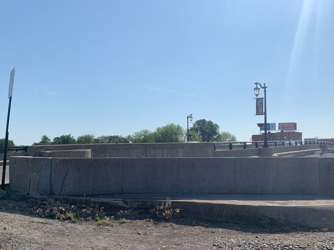 The city's Sandusky River flood wall will soon be getting an eye-catching makeover, with Downtown Fremont, Inc. planning to put a series of murals on the wall as part of a new public art program.