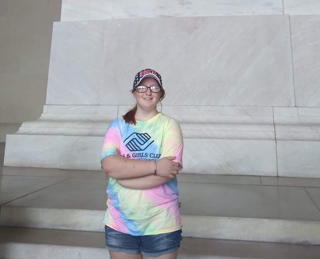 Jersey Howe stands in front of the Lincoln Memorial while on the Boys & Girls Club's trip to Washington, D.C.