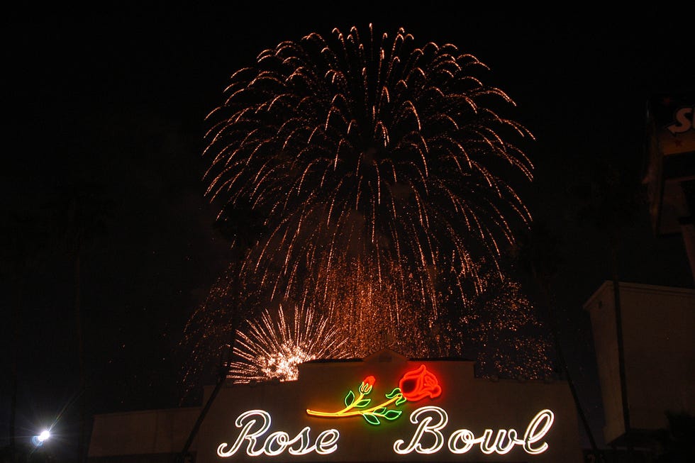 Fireworks explode over the Rose Bowl during the 4th of July Taste of America.