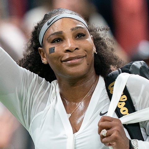 Serena Williams leaves Centre Court after her firs