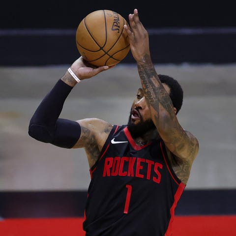 John Wall was traded by the Washington Wizards to 