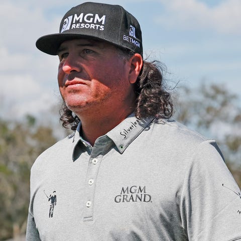 Pat Perez walks onto the eighth tee box during the