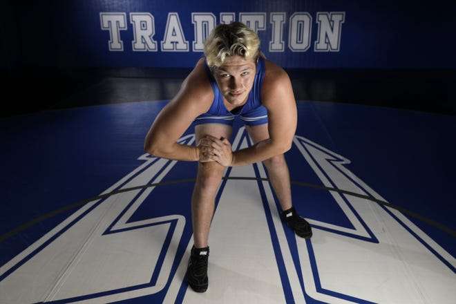Garrett Tyre lines up in the wrestling training room of Clay High School's gym. Tyre has been named the boys' All-First Coast wrestler of the year for 2022. Photographed Tuesday, June 28, 2022. [Bob Self/Florida Times-Union]