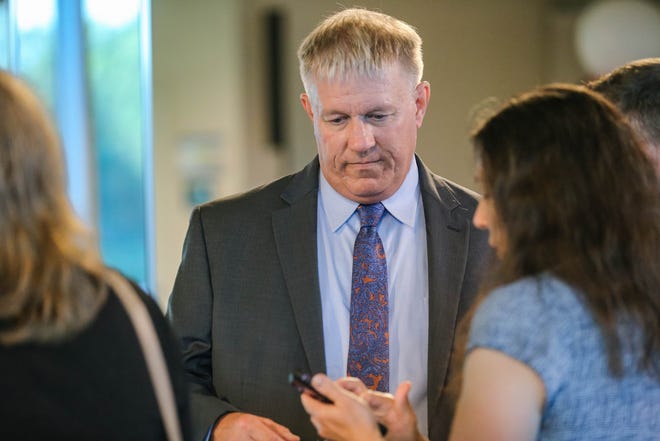 Kevin Calvey, who is running for Oklahoma County district attorney, talks to guests at a watch party at The Capitol View Event Center in Oklahoma City Tuesday.