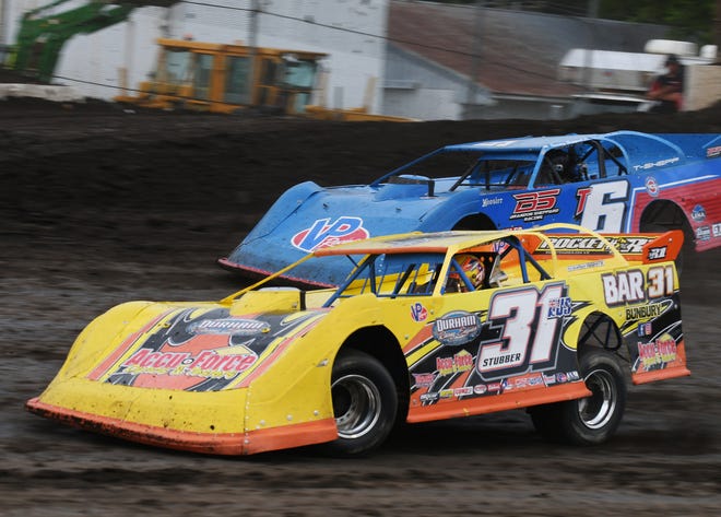 Paul Stubber (31) races Tommy Sheppard Jr. (6) recently at Fairbury Speedway. Stubber, from Australia, has found a liking to racing late models in America.