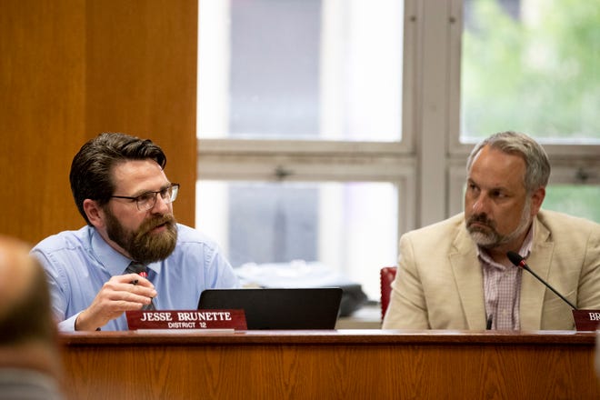 District 12 City Council member Jesse Brunette, left, speaks during the Green Bay council meeting June 28 at City Hall as fellow council member Brian Johnson looks on. Last week, Brunette was with the majority seeking a smaller increase in city spending in 2023 than the mayor proposed. Johnson opposed the cuts to the spending proposal.