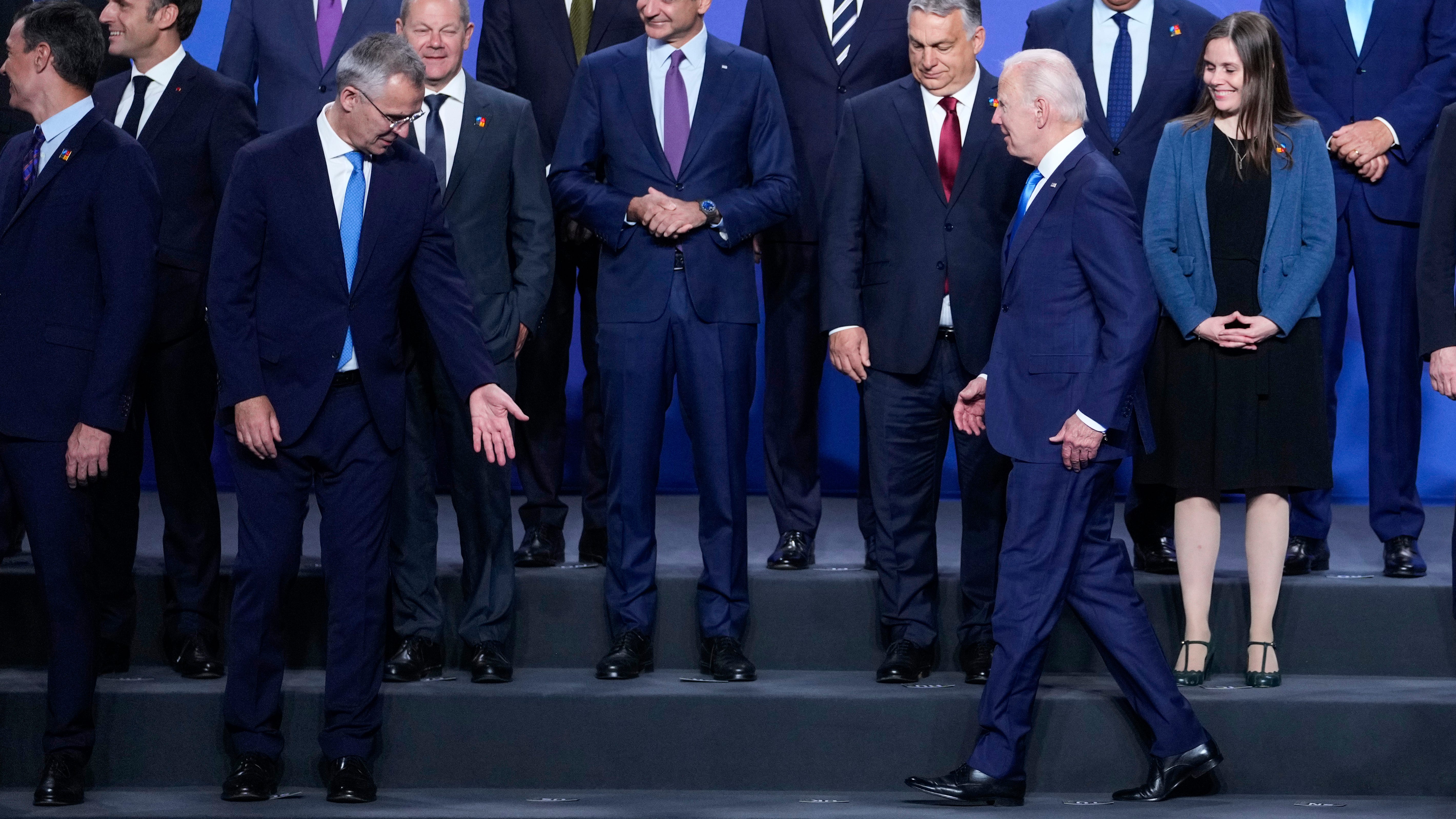 U.S. President Joe Biden, front right, arrives for a group photo during the NATO summit in Madrid, Spain, on Wednesday, June 29, 2022.