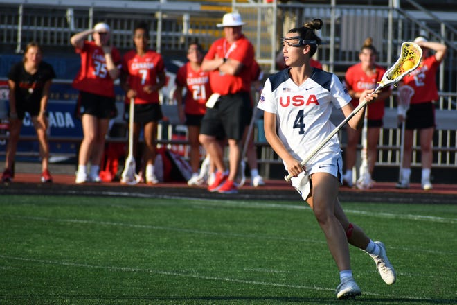 Moorestown native Marie McCool drives through the midifeld against Canada at the 2022 Women's Lacrosse World Cup