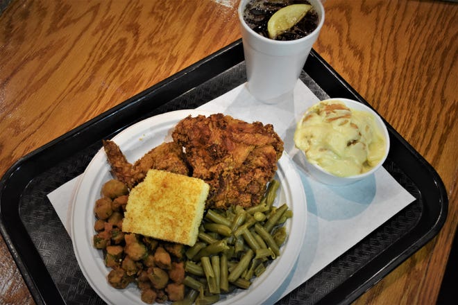 The menu at Cool Cafe in Franklin, Tenn. featured hot chicken, a plethora of sides including fried okra, broccoli salad, mac and cheese, and cornbread, as well as the owner's beloved banana pudding on Wednesday, July 29, 2022.
