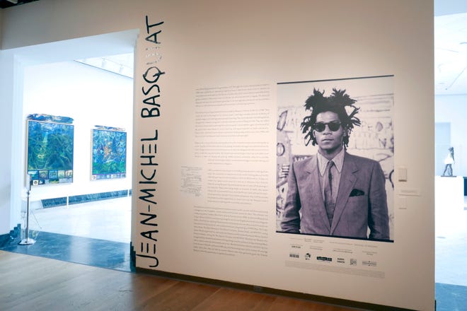 Entrance to an exhibit by artist Jean-Michel Basquiat is seen at the Orlando Museum of Art on June 1, 2022, in Orlando, Fla. The FBI raided the art museum on Friday, June 24, 2022, and seized more than two dozen paintings attributed to Basquiat following questions about their authenticity.