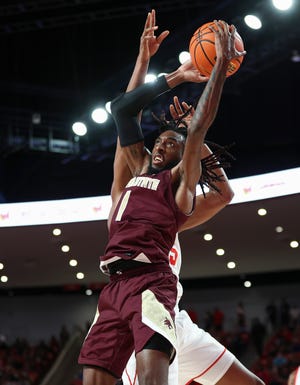 Texas State forward Isiah Small fights for a rebound against Houston in December. The Bobcats have won back-to-back Sun Belt regular-season championships, earning a five-year contract extension for coach Terrance Johnson.