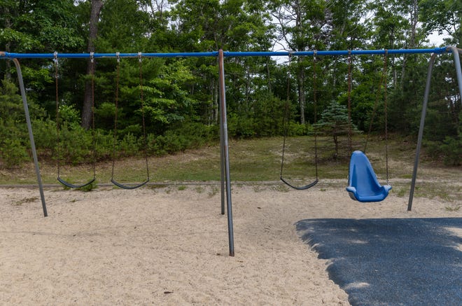 The playground has only one entrance for people with disabilities to access the swings.