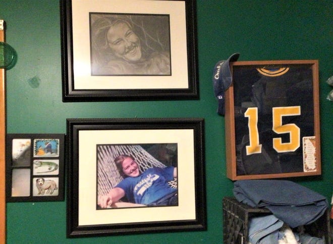 Sterling-Fanessa Fisher's photographs, sports memorabilia, and artwork can be found throughout her parents' home.