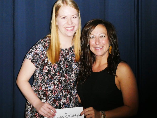 Pontiac Township High School hosted its annual Awards Night at the end of the school year. Among the awards presented to PTHS seniors was the Eva Mae Loy Scholarship in memory of Rotarian Phil Loy Scholarship. Lydia Grampp, left, received the award from presenter Erin Jensen.
