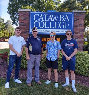 Posing in front of the Catawba College marquis are  (from left) Nick Pueschel, Woody Weaver, Mason Guffey  and  Kody Lineberger.