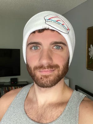 In this photo provided by Matt Ford, a monkeypox spot can be seen on his chin.