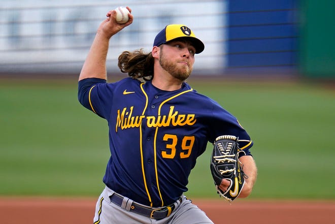 Milwaukee Brewers starting pitcher Corbin Burnes delivers during the second inning of a baseball game against the Pittsburgh Pirates in Pittsburgh, Friday, July 1, 2022. (AP Photo/Gene J. Puskar) ORG XMIT: PAGP112