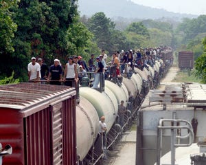 Photo captured by María de Jesús Peters of Central American migrants atop the train known as "The Beast" as they make their way to the U.S.-Mexico border.