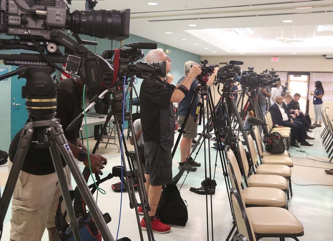 The media sets up Sunday at Firestone Park Community Center for a press conference about the police shooting death of Jayland Walker.