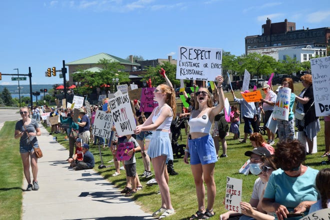 A protest over the overturning of Roe v. Wade by the U.S. Supreme Court took place along US-31 in front of the hole in downtown Petoskey on Sunday, June 3.