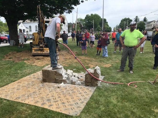 RUTLAND - A jackhammer was used to break up the concrete block found buried near the O'Raisor headstone on City Street. Despite high hopes, no time capsule was found in the block.