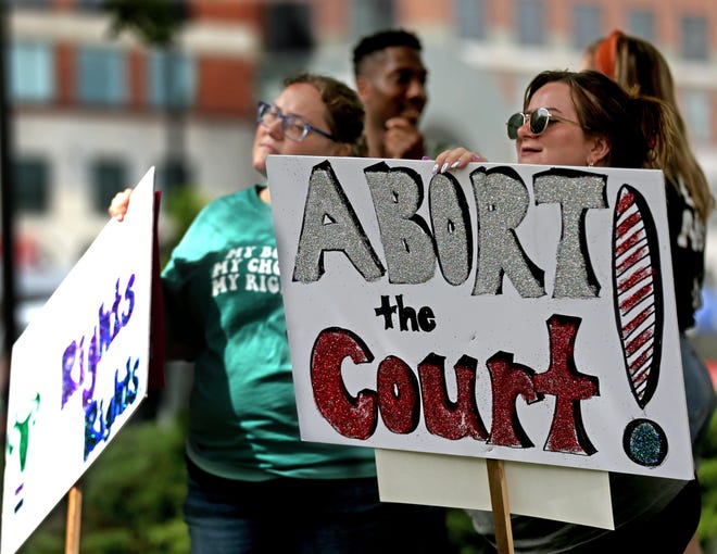 Milwaukee Protesters Call for Abortion Access and Boycott on July 4 Ashley Ellis, left, and her sister-in-law Kelsi Ellis, of Racine, meet others in Red Arrow Park before beginning their walk to the Milwaukee Federal Building and the US Courthouse. on Monday, July 4, 2022.