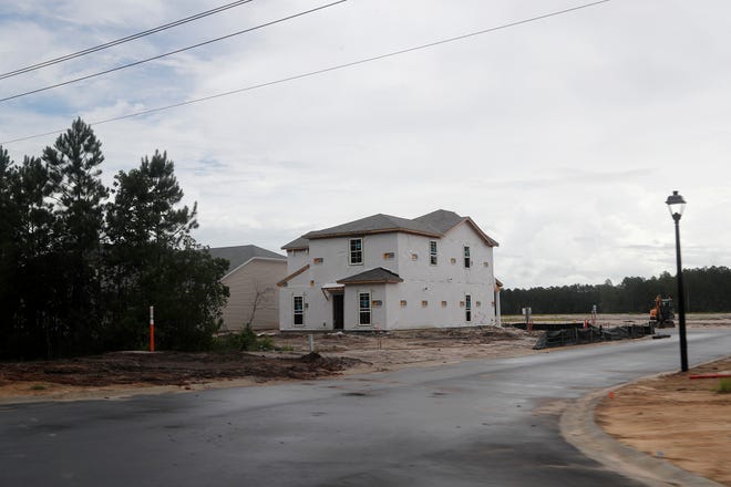 Houses are being built in a new area being developed on Little Neck Road.