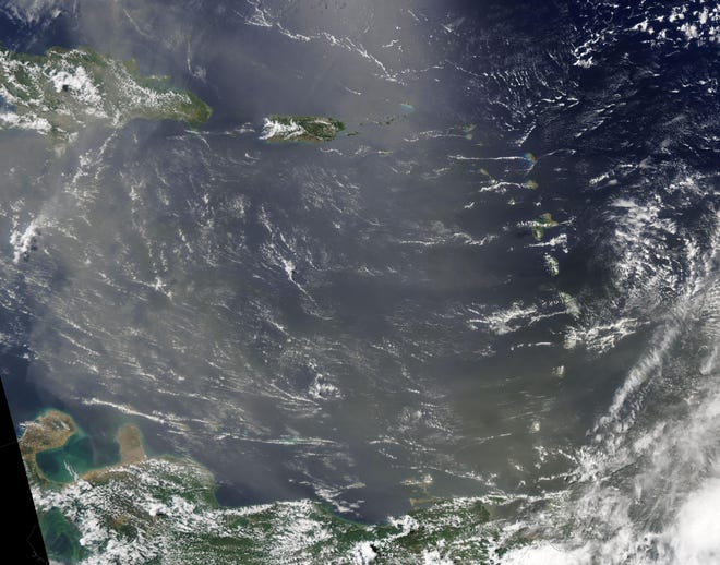 Dust storms over the Atlantic Ocean and Caribbean Sea -- like this one in June 2022 -- can fuel Sargassum seaweed growth that piles up on Florida beaches.