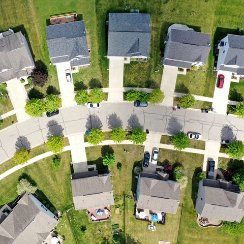 Aerial view of a subdivision and houses in a neigh