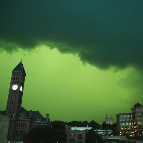 Skies in downtown Sioux Falls turn black and green