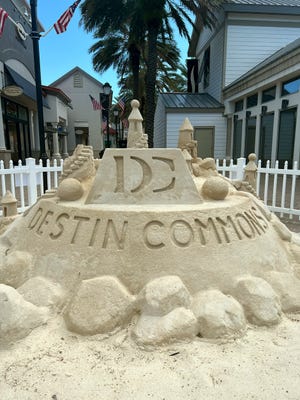 Destin Commons welcomes summer with three sand castles constructed by Rick Mungeam, a sand sculpting professional of 12 years. He built each one from the ground up, using up to 8 tons of sand.