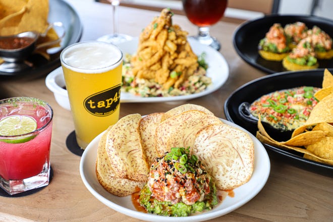 At Tap 42, a spicy tuna tartare is served with spicy mayo and malanga chips.