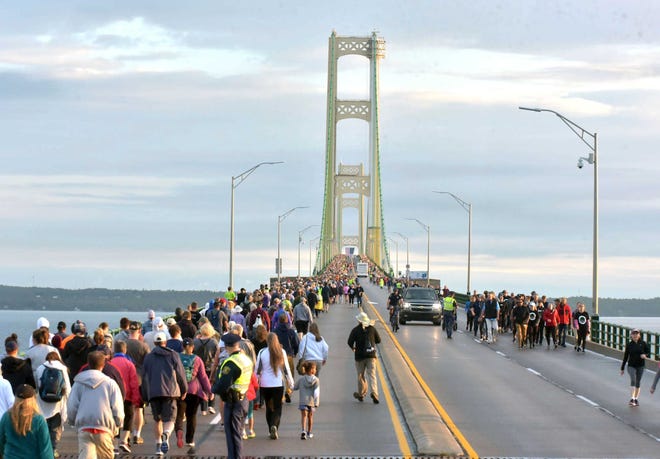Pedestrians walk the Mackinac Bridge on Monday, Sept. 2, 2019, during the 62nd annual Labor Day Bridge Walk. The 2022 walk will take place Sept. 5.