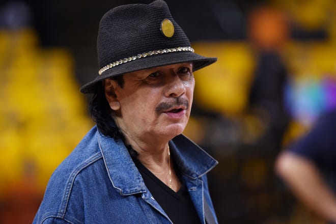 Carlos Santana dibebaskan dari rumah sakit setelah pingsan di panggung Pine Knob