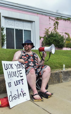 Beau Black, 33, rallies for abortion while wearing two bibles as shoes outside of the Jackson Women’s Health Organization on the last day the clinic is legally allowed to be open in Jackson, Miss., Wednesday, July 6, 2022.