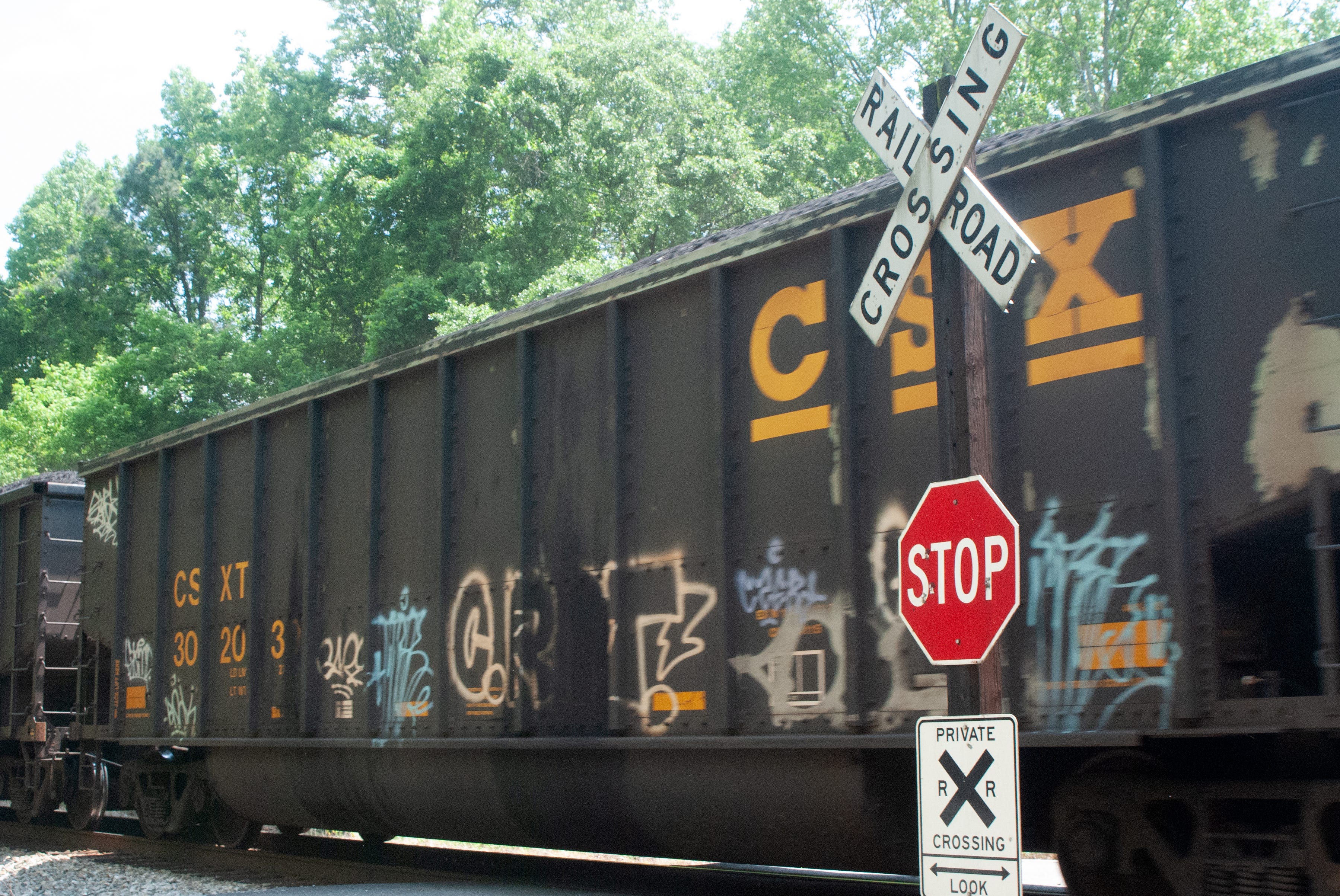 A CSX train travels across a private crossing in Lanexa, Virginia. Freeda Pruitt, 55, died at the crossing in 2021 after a CSX freight train t-boned her car.
