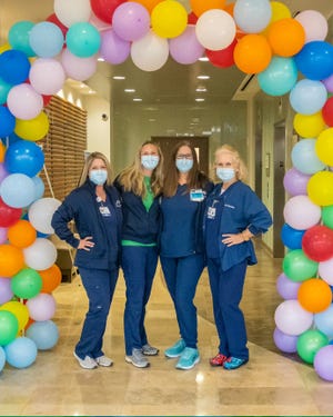 Keri von Rosenberg , second from left, with her team at Baylor Scott & White Lakeway, has learned to lean on co-workers more because of the experience of COVID-19.