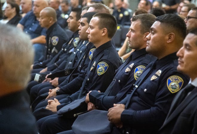 Stockton Police officers listen to newly sworn-in Stockton Police Chief Stanley McFadden speak during a ceremony at the Stockton Memorial Civic Auditorium in downtown Stockton on June 2, 2022.